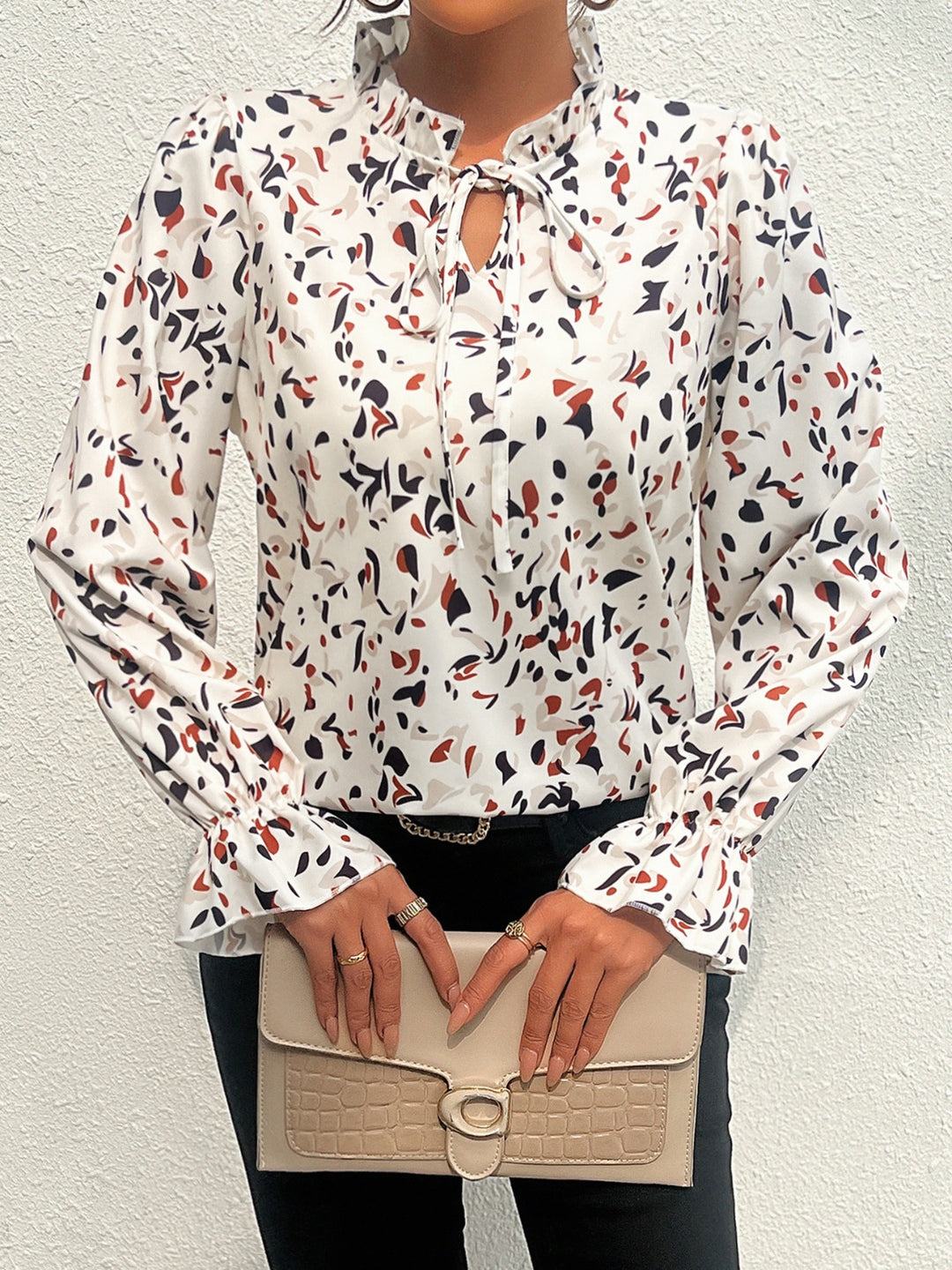 Ruffled Printed Tie Neck Long Sleeve Blouse